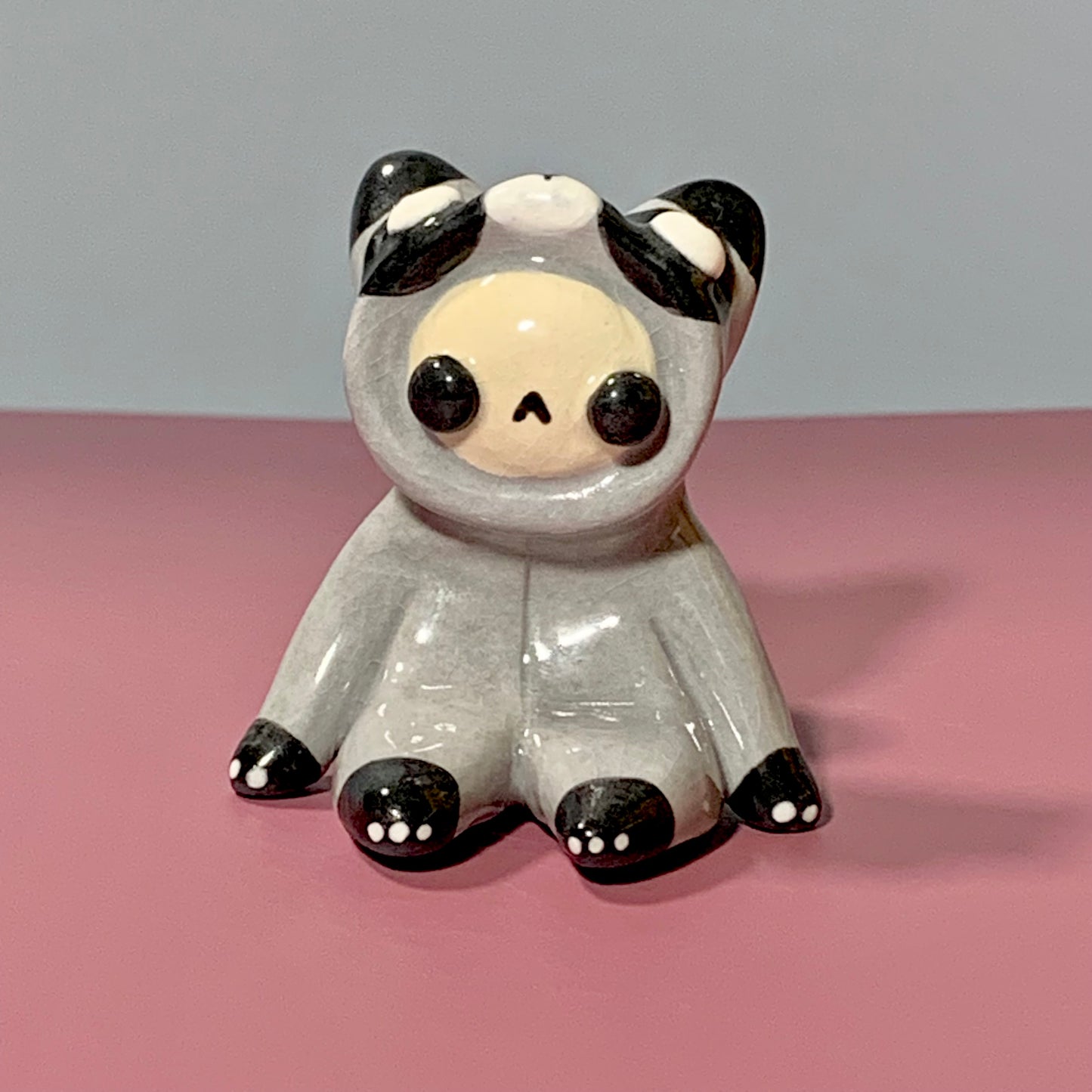 Cute Raccoon Costumed Ceramic Figurines