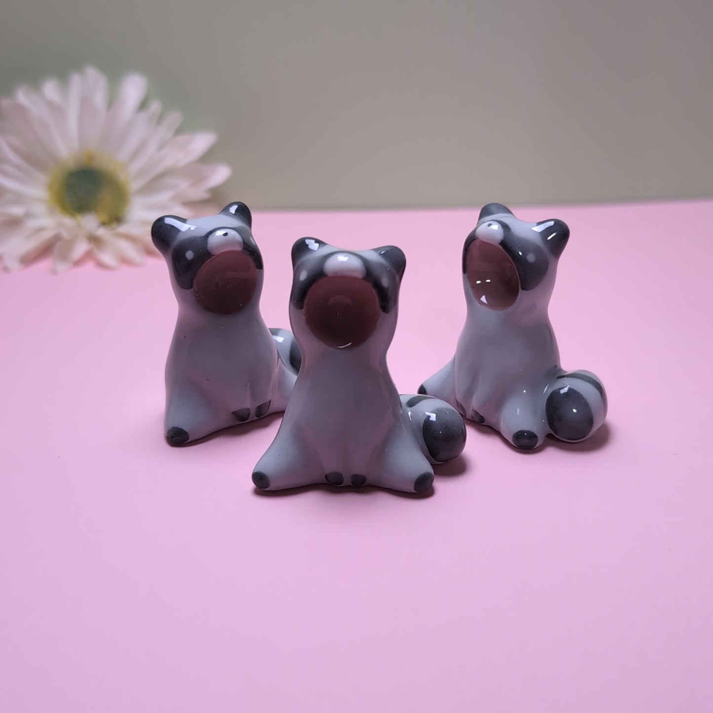 Screaming Raccoon Ceramic Figurine