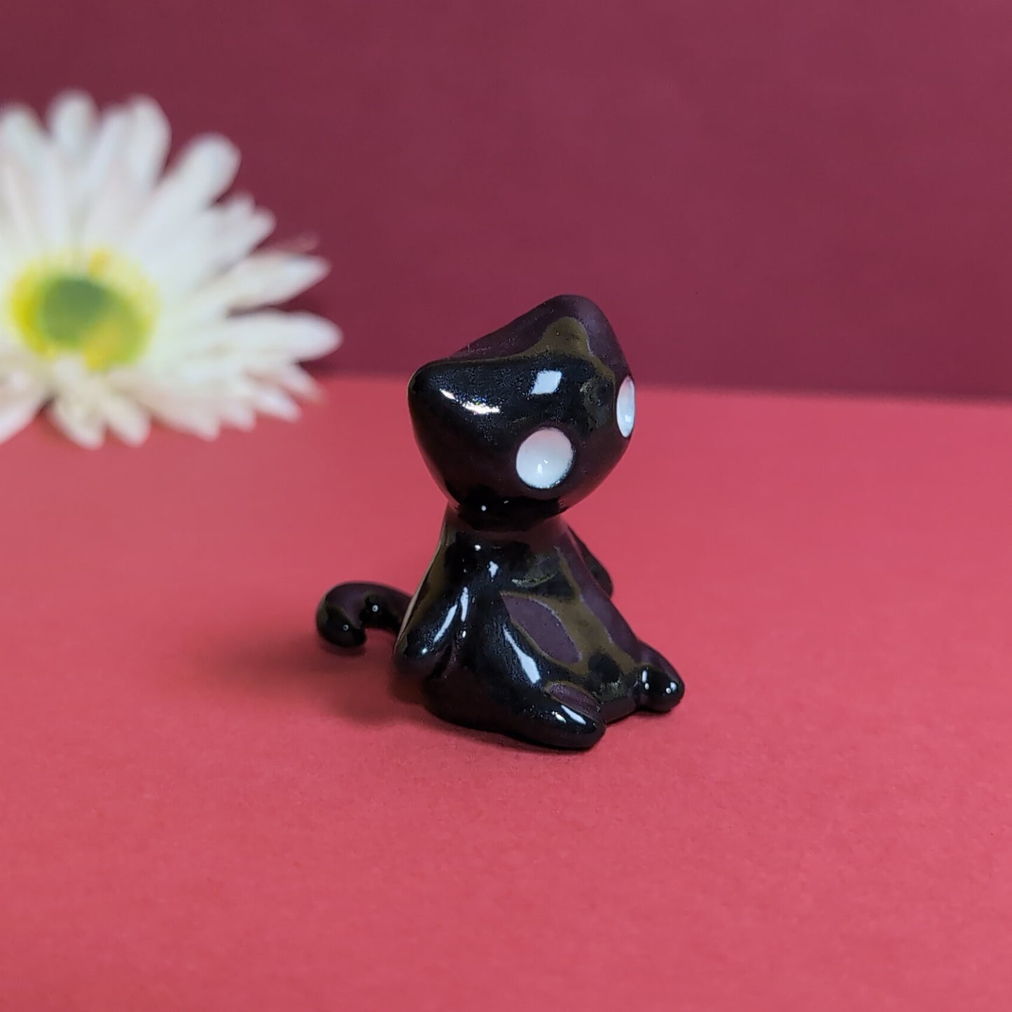 Slouching Black Void Cat Ceramic Figurine