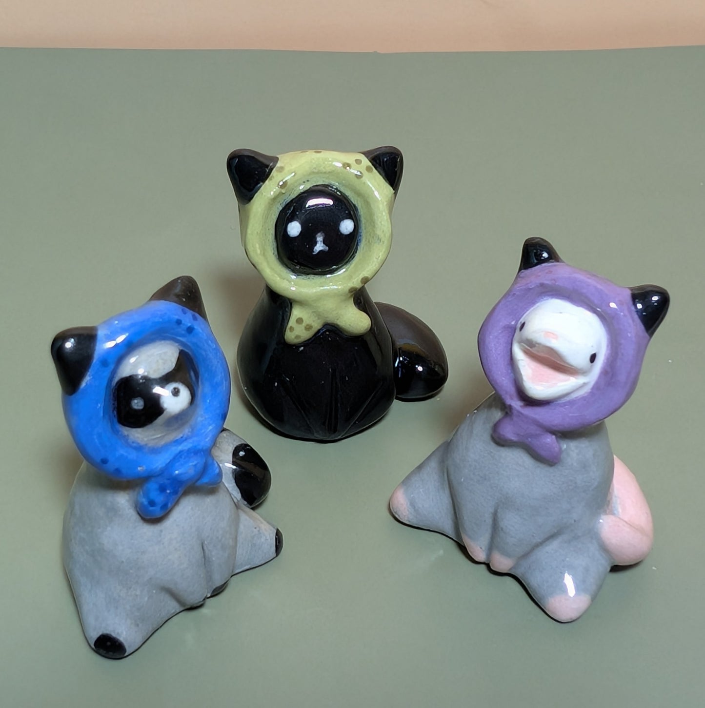 Babushka Raccoon Ceramic Figurine