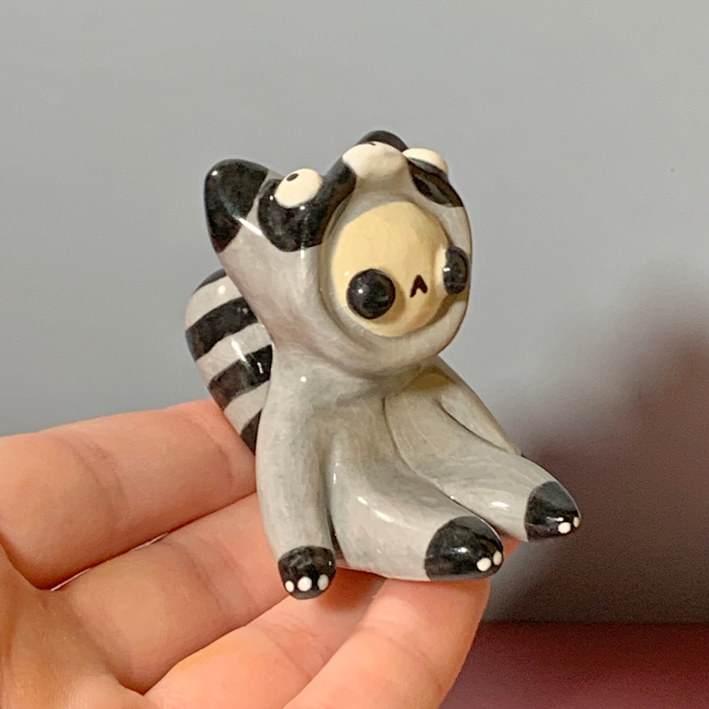 Cute Raccoon Costumed Ceramic Figurines
