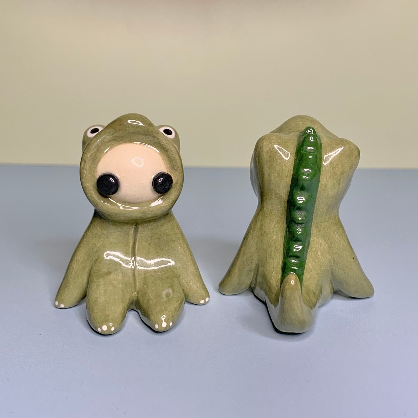 Cute Dino Costumed Ceramic Figurines
