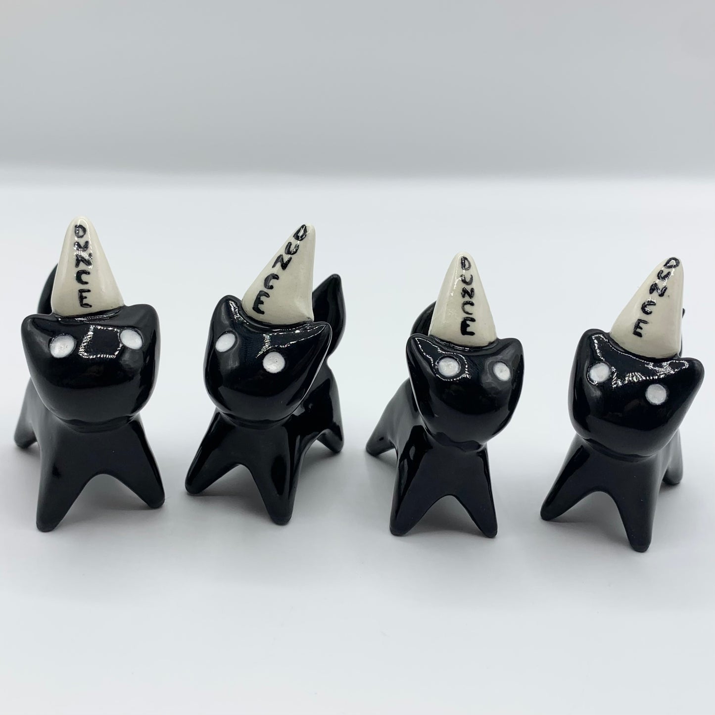 Silly Dunce Kitty Ceramic Figurine