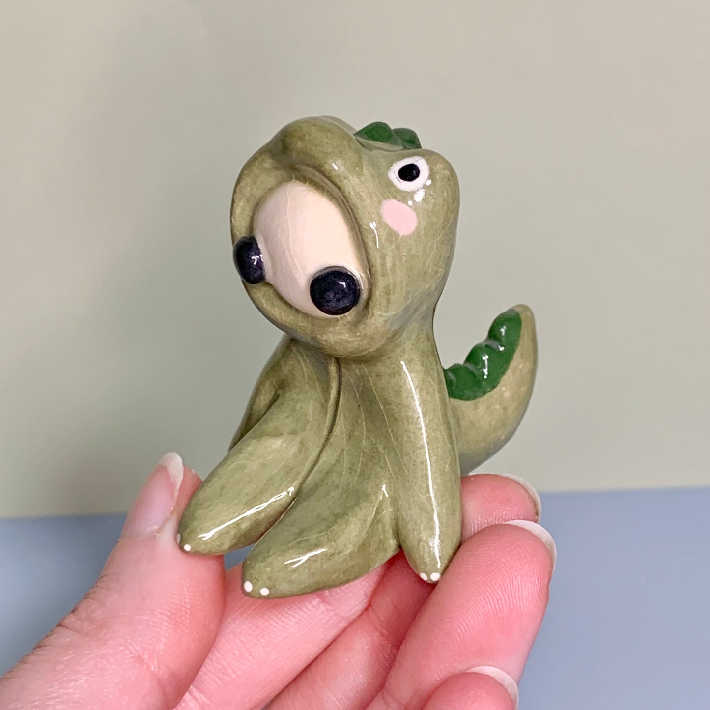 Cute Dino Costumed Ceramic Figurines