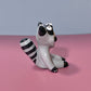 Cute Raccoon Costumed Ceramic Figurines