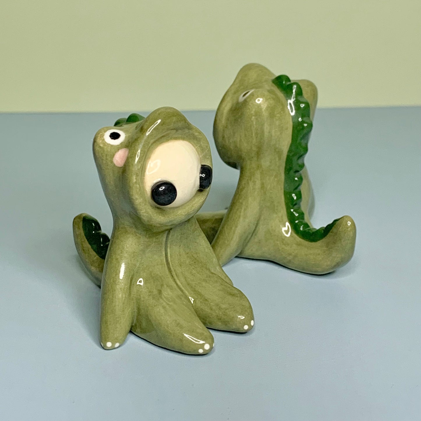 Cute Dino Costumed Ceramic Figurines