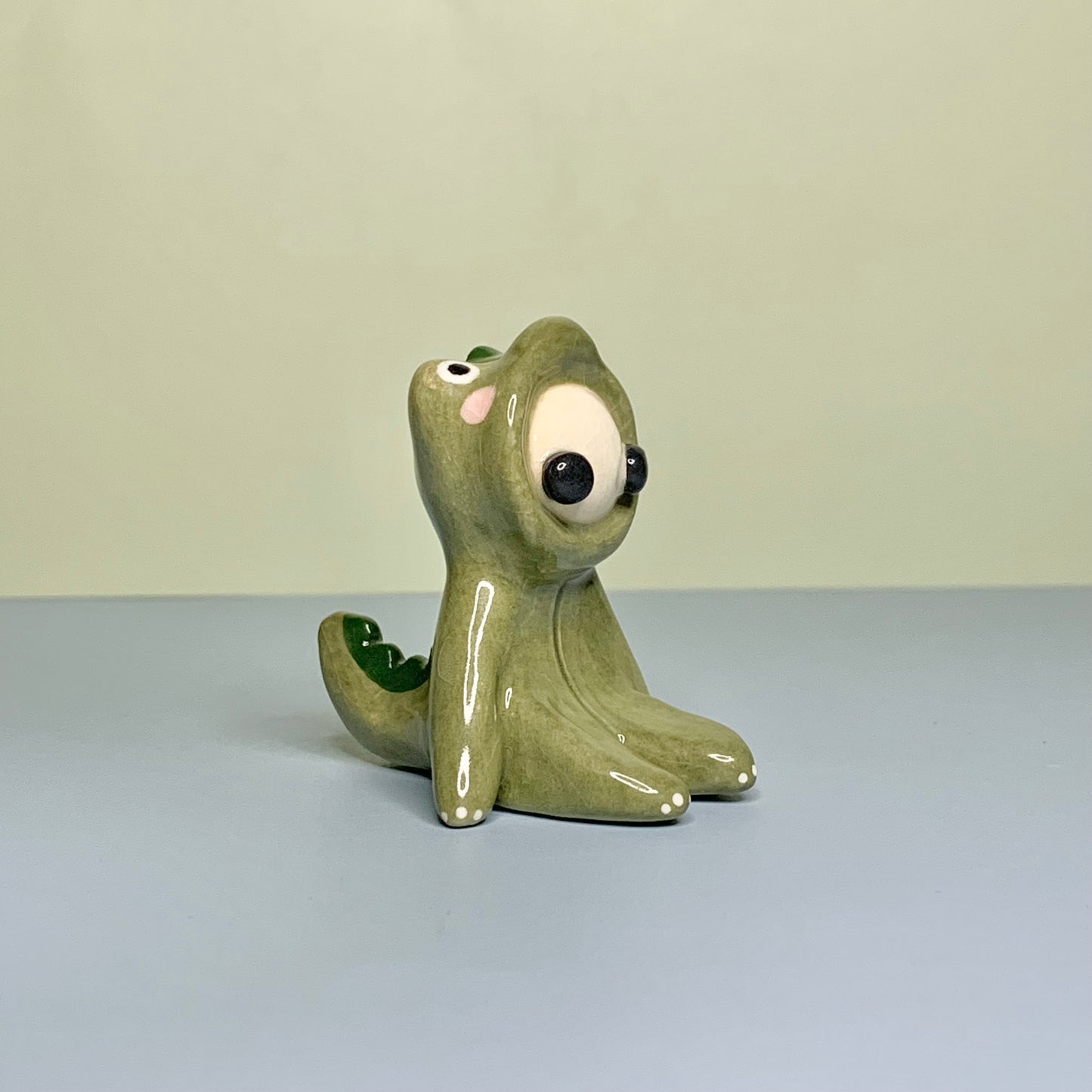 Cute Dino Costumed Ceramic Figurines
