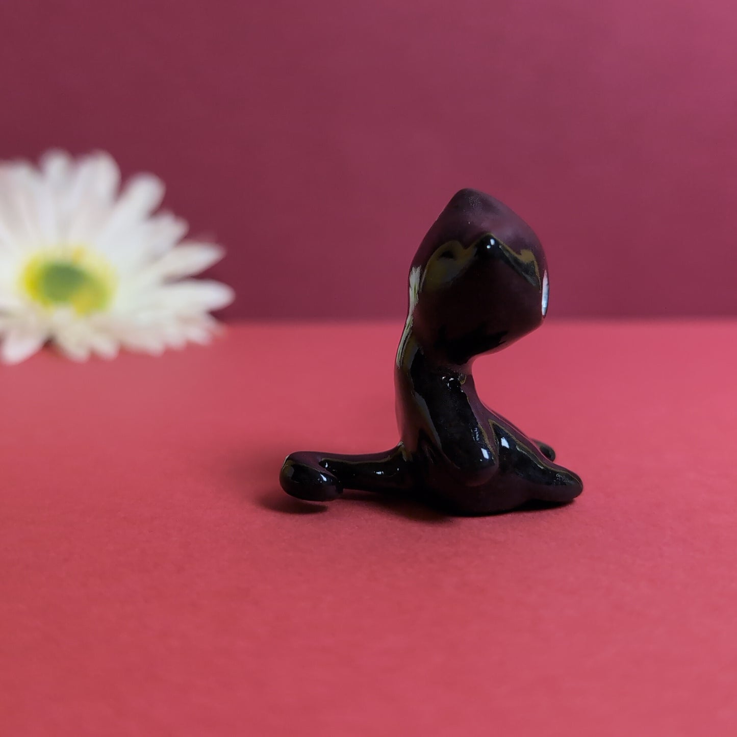 Slouching Black Void Cat Ceramic Figurine