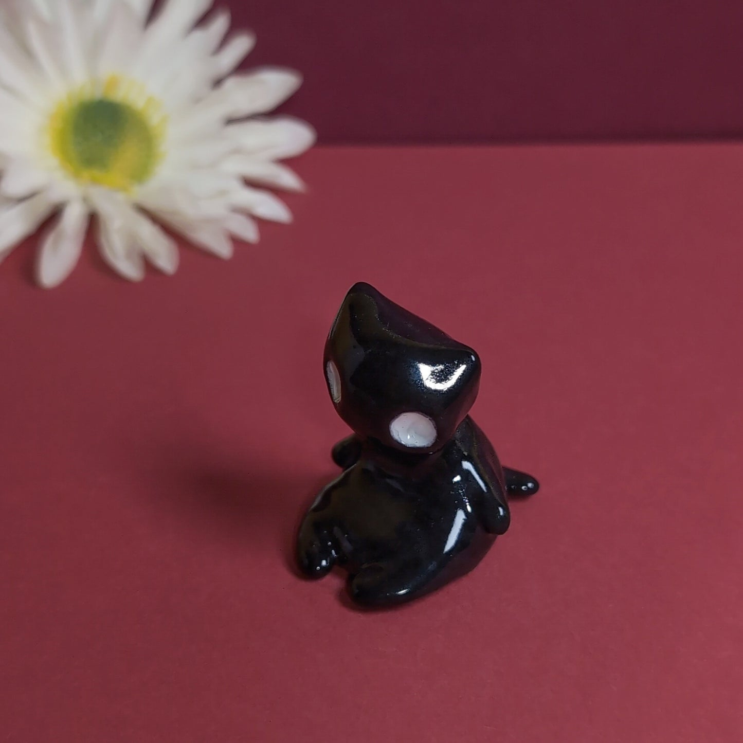 Slouching Black Void Cat Ceramic Figurine