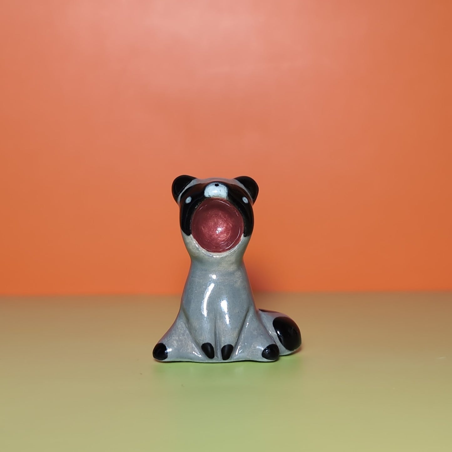Screaming Raccoon Ceramic Figurine