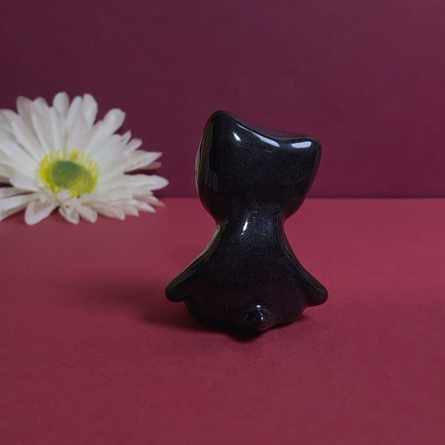 Slouching Black Void Cat Ceramic Figurine