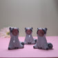Screaming Raccoon Ceramic Figurine
