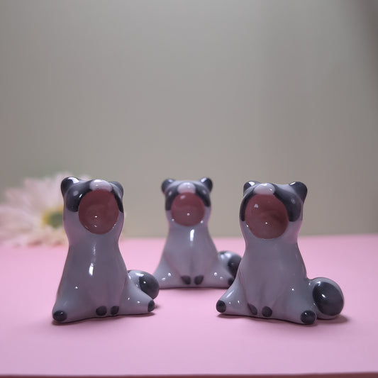 Screaming Raccoon Ceramic Figurine