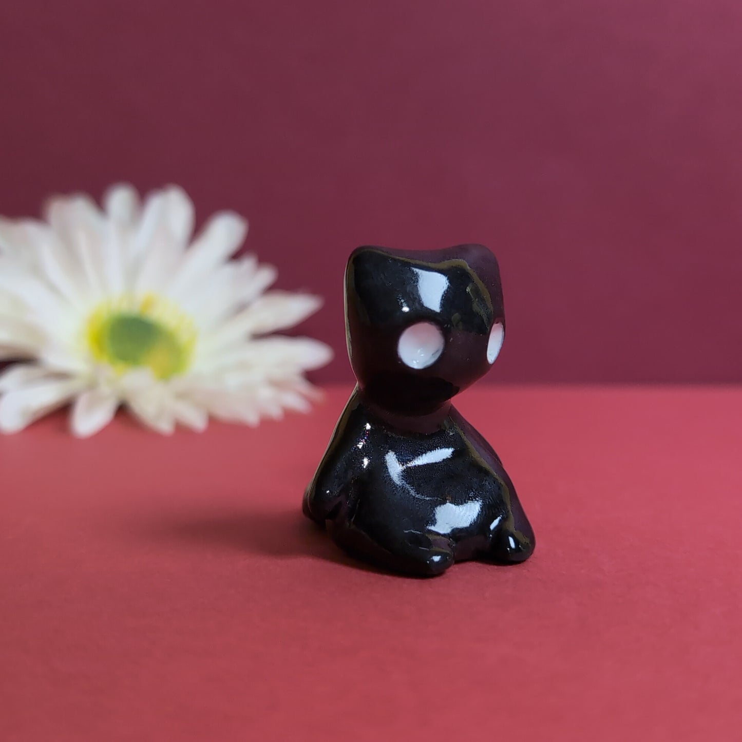 Slouching Black Void Cat Ceramic Figurine