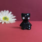 Slouching Black Void Cat Ceramic Figurine