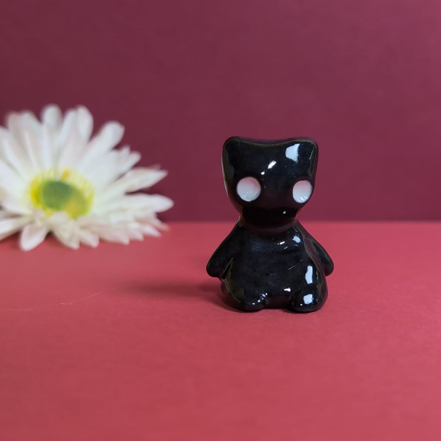 Slouching Black Void Cat Ceramic Figurine