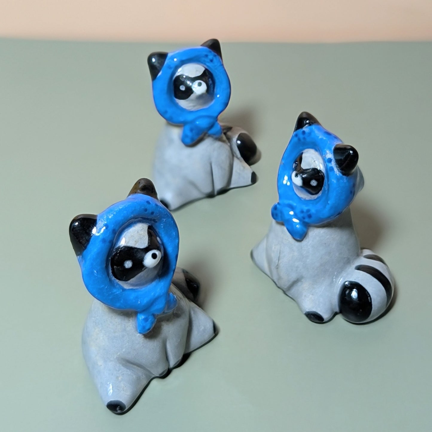 Babushka Raccoon Ceramic Figurine