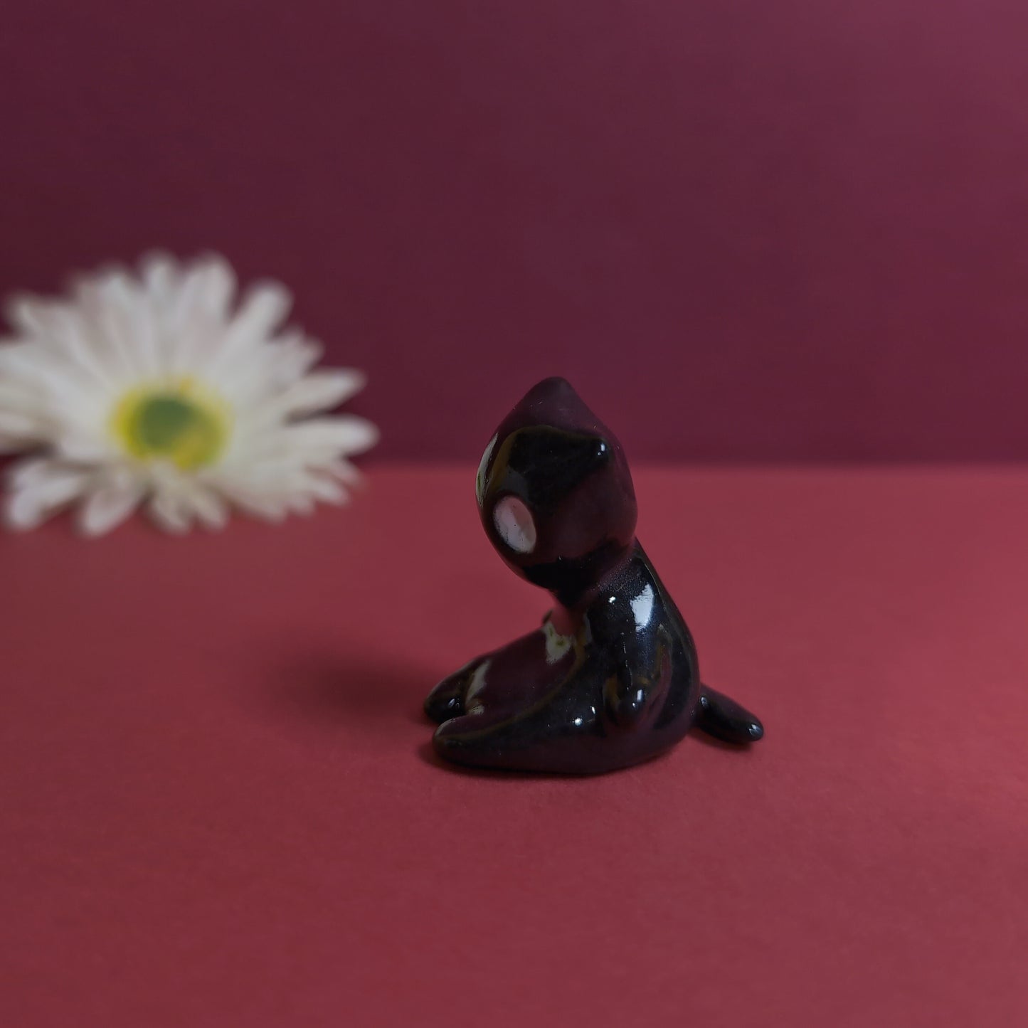 Slouching Black Void Cat Ceramic Figurine