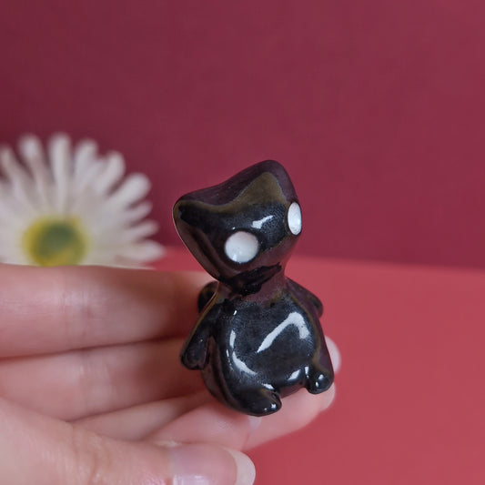 Slouching Black Void Cat Ceramic Figurine