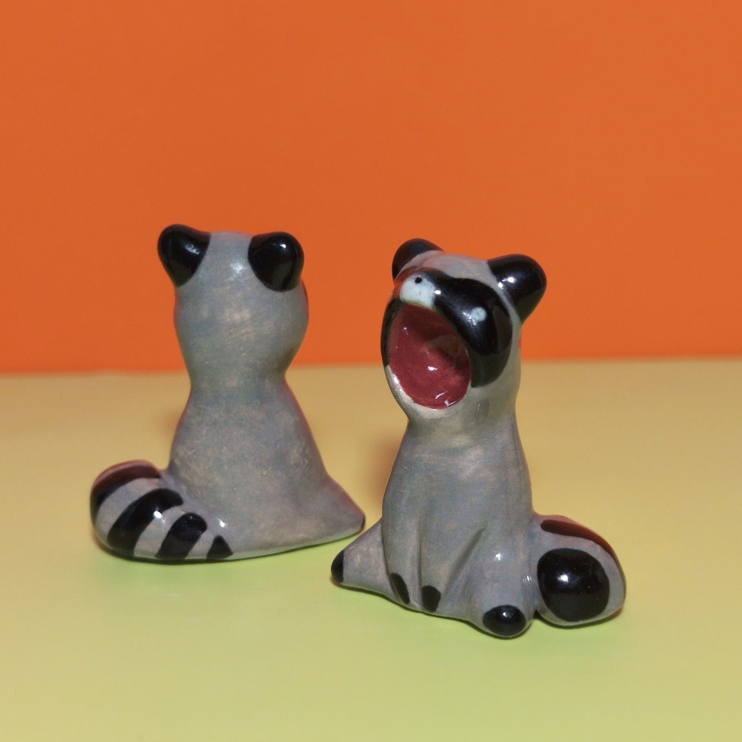 Screaming Raccoon Ceramic Figurine