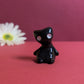Slouching Black Void Cat Ceramic Figurine