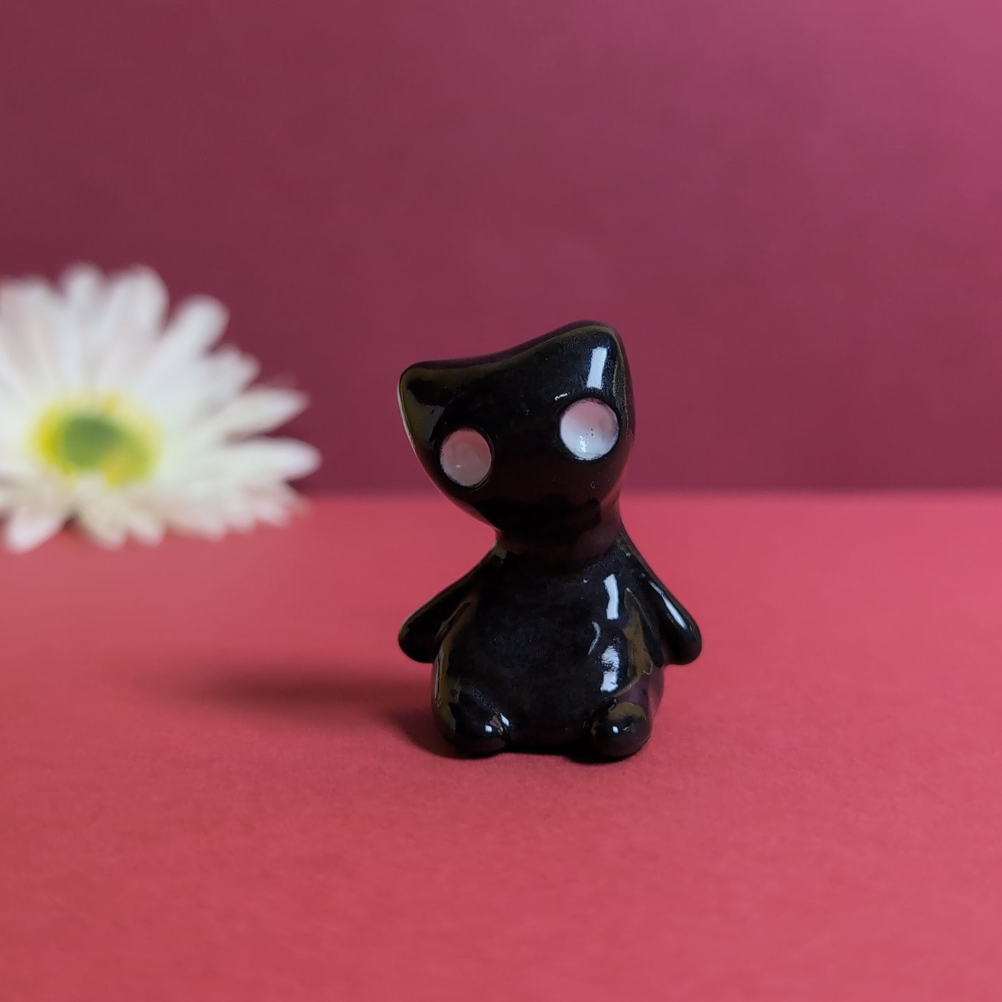 Slouching Black Void Cat Ceramic Figurine