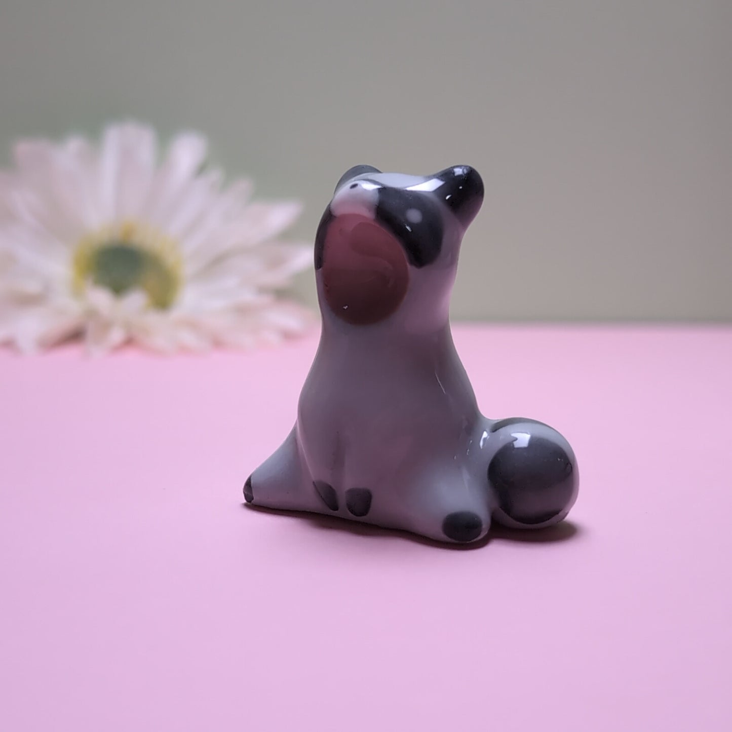 Screaming Raccoon Ceramic Figurine