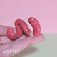 Wormy Ceramic Figurine