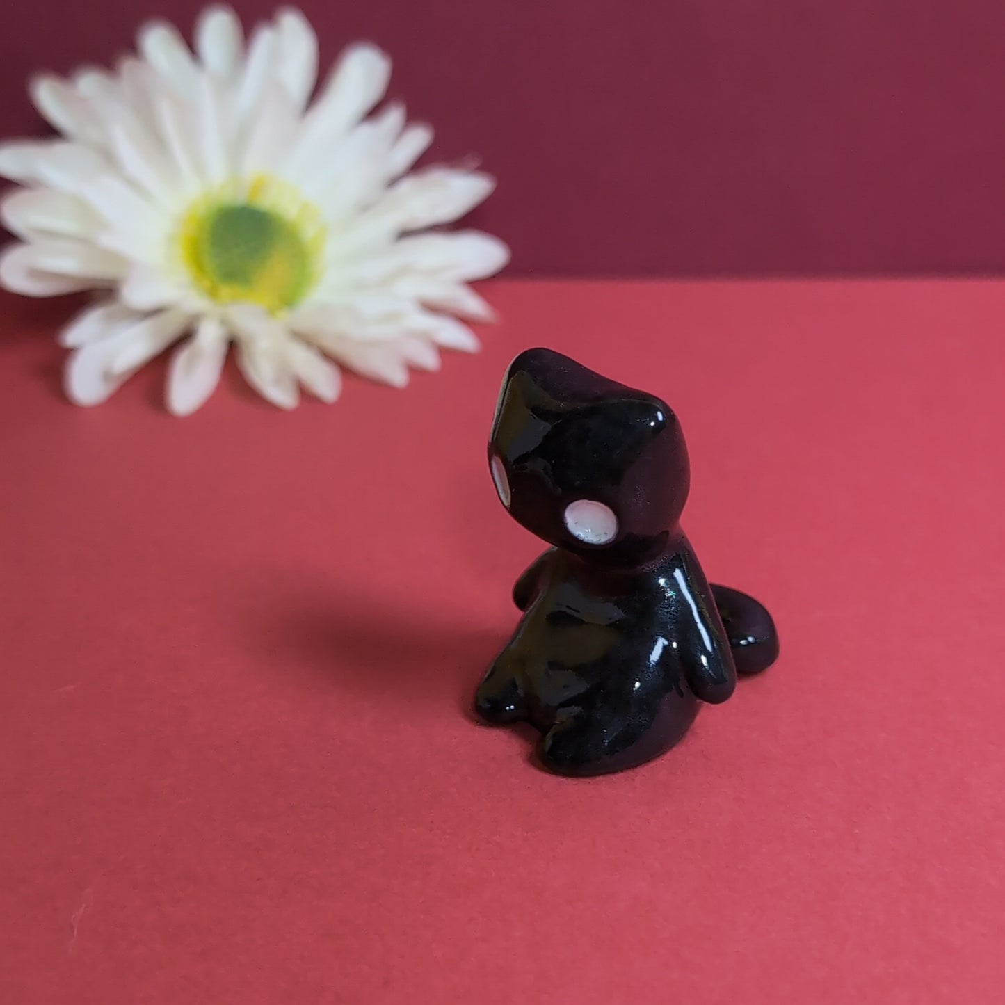 Slouching Black Void Cat Ceramic Figurine