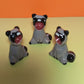 Screaming Raccoon Ceramic Figurine