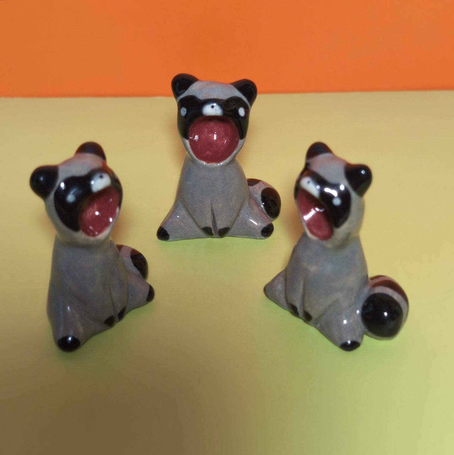 Screaming Raccoon Ceramic Figurine