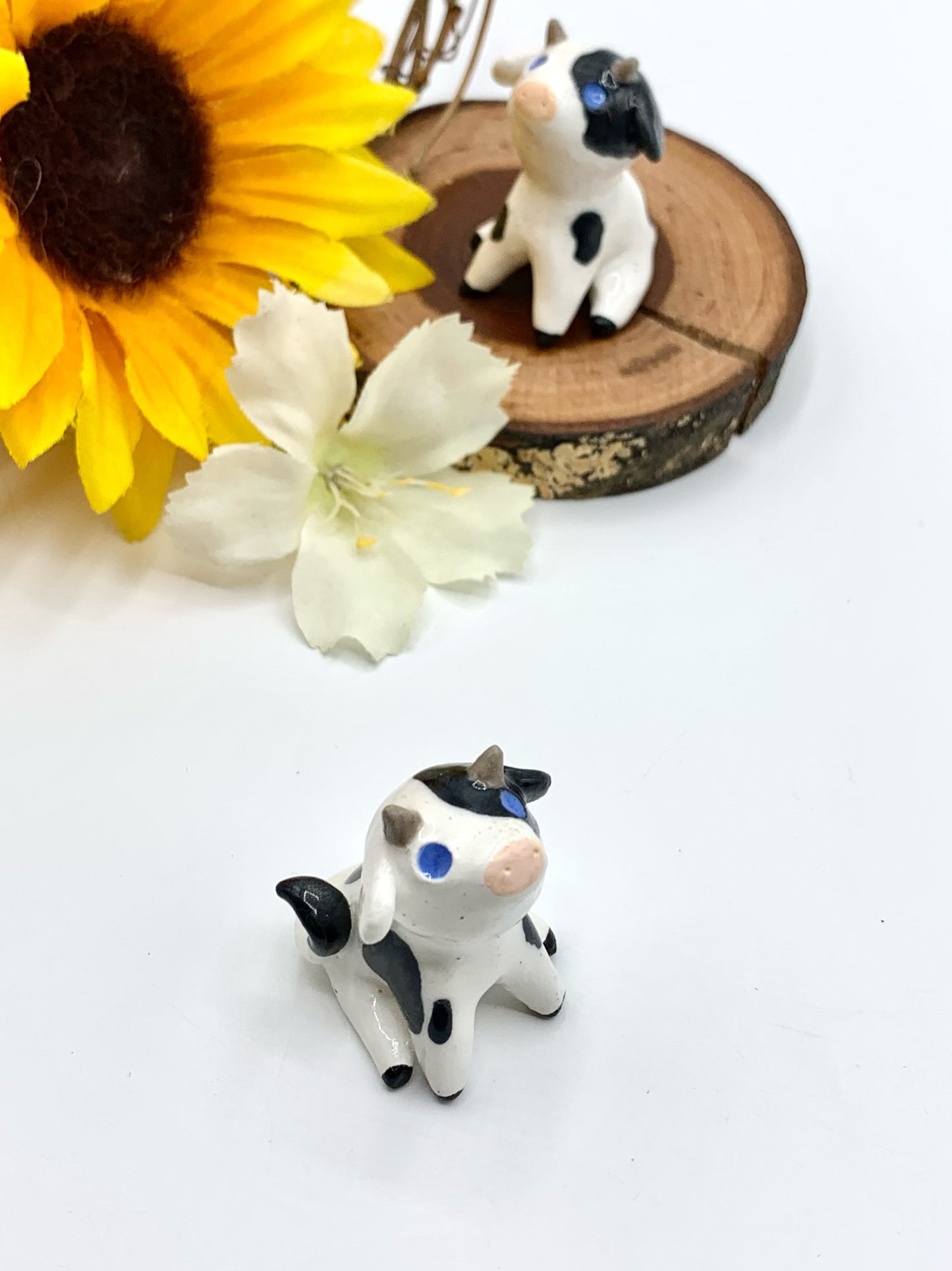 Ceramic Cow Figurine Sitting