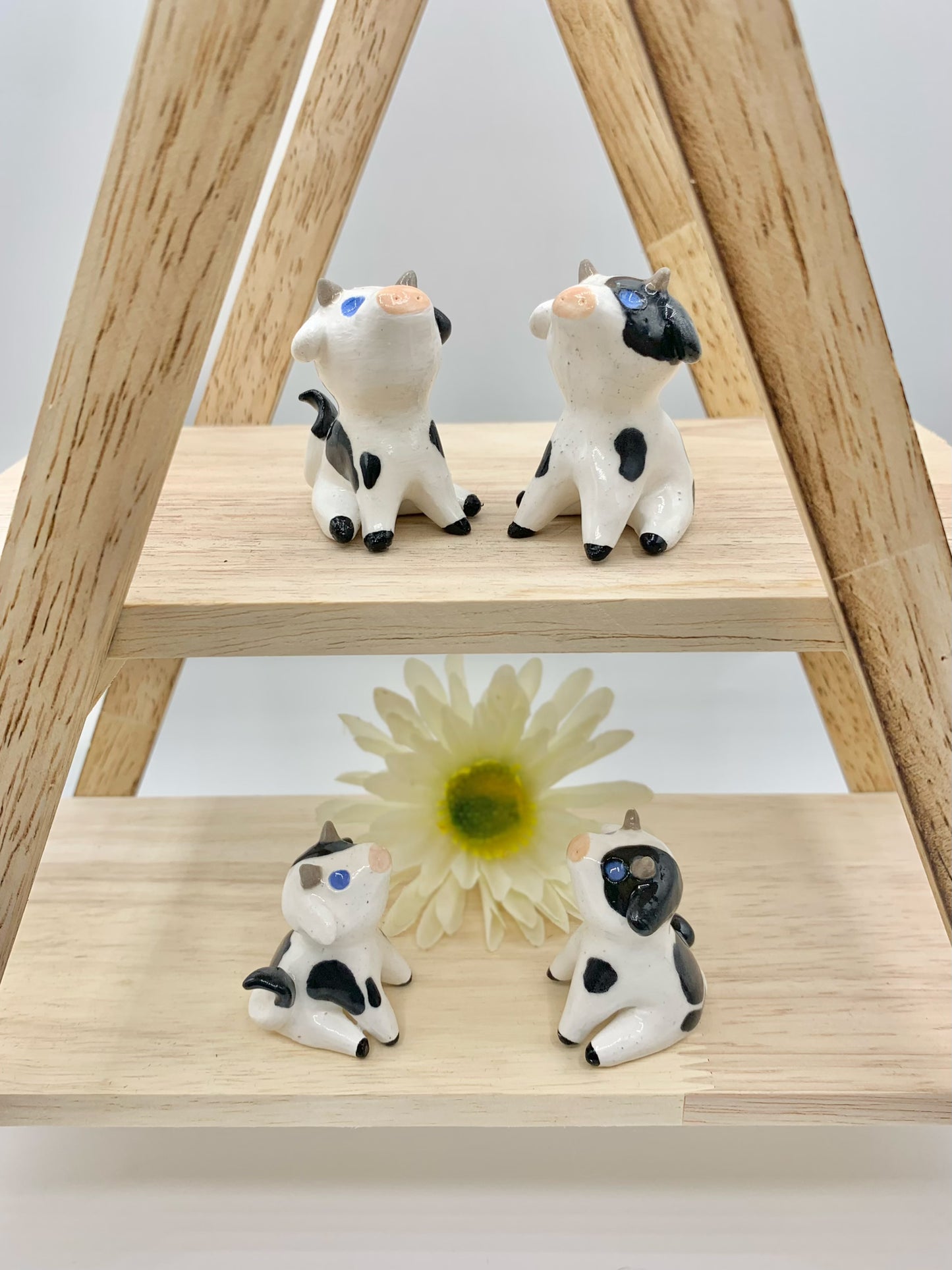 Ceramic Cow Figurine Sitting