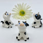 Ceramic Cow Figurine Sitting