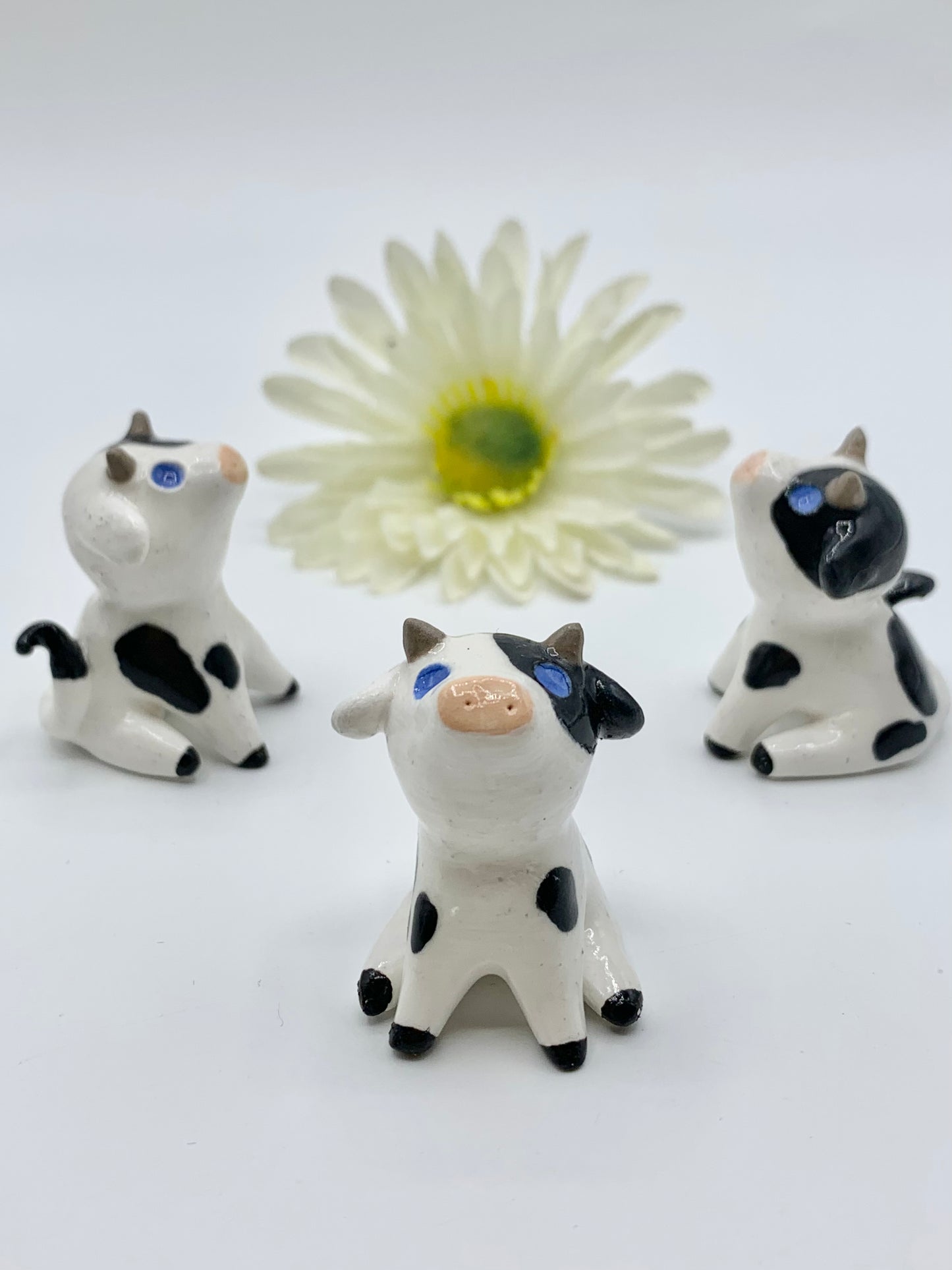 Ceramic Cow Figurine Sitting