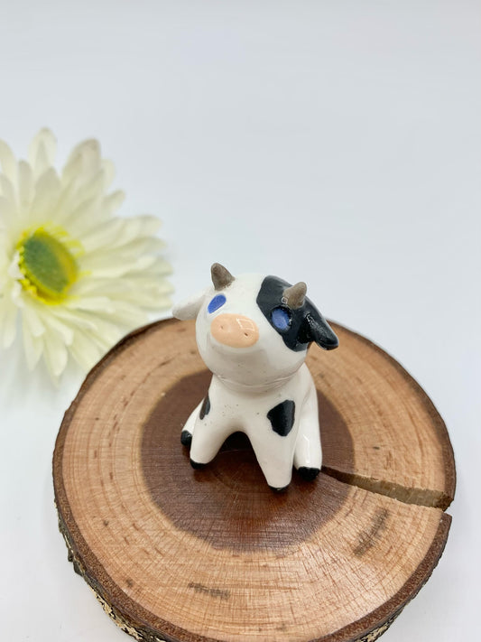 Ceramic Cow Figurine Sitting