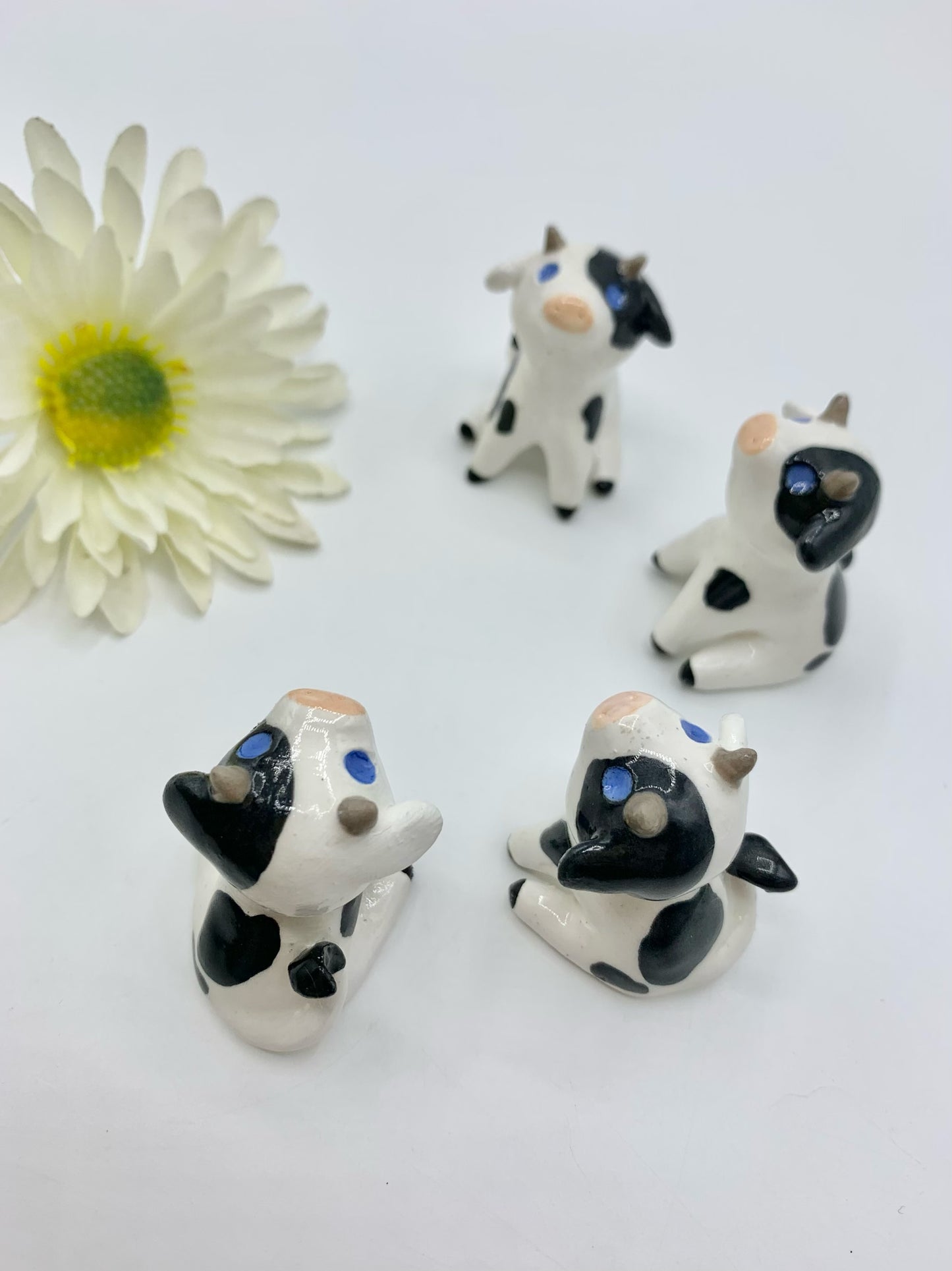 Ceramic Cow Figurine Sitting