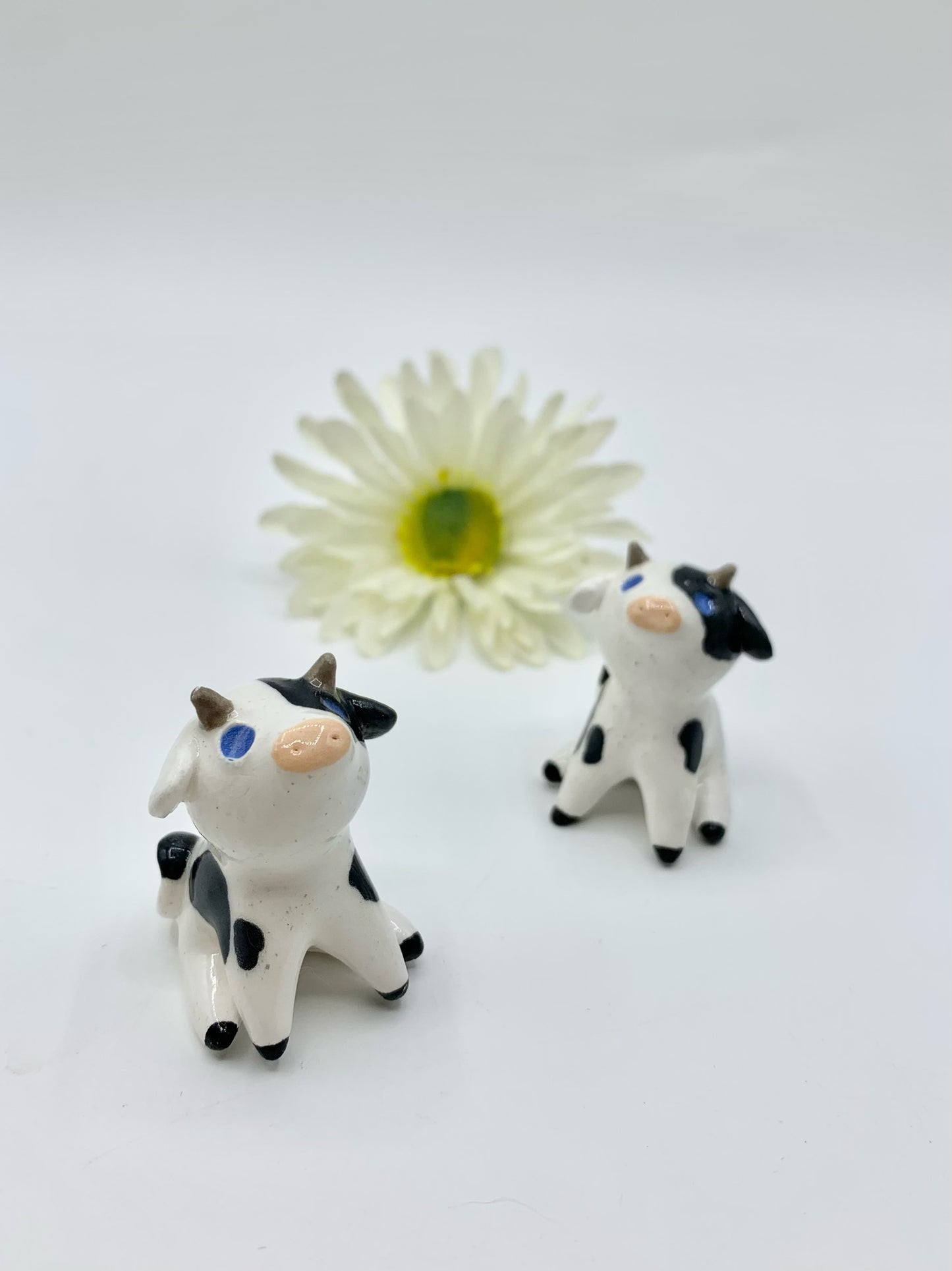 Ceramic Cow Figurine Sitting